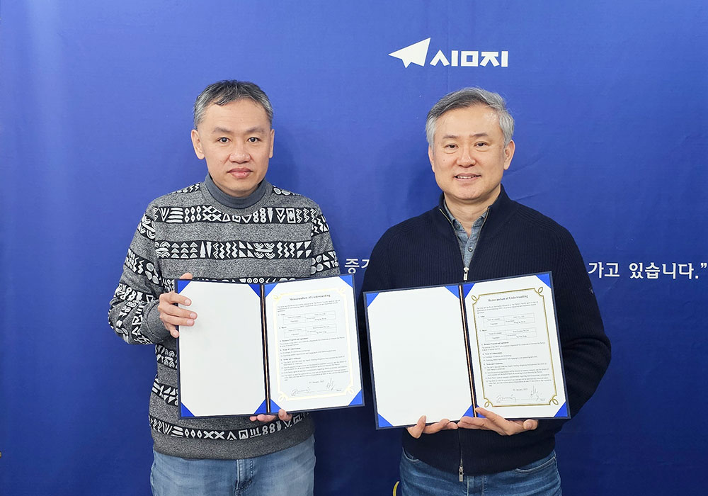 Ảnh các CEO của SimG và công ty Đông Nam Á chụp kỷ niệm sau khi ký kết MOU